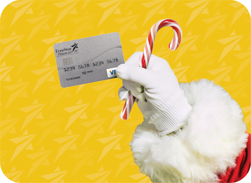 Santa holding FSF card and candy cane